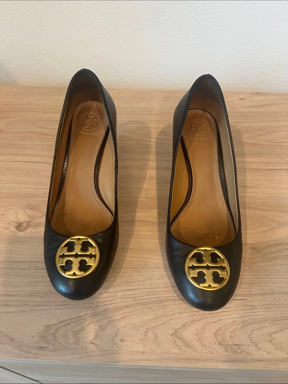 Tory Burch Black Leather Wedge Pumps with Gold Logo Medallion